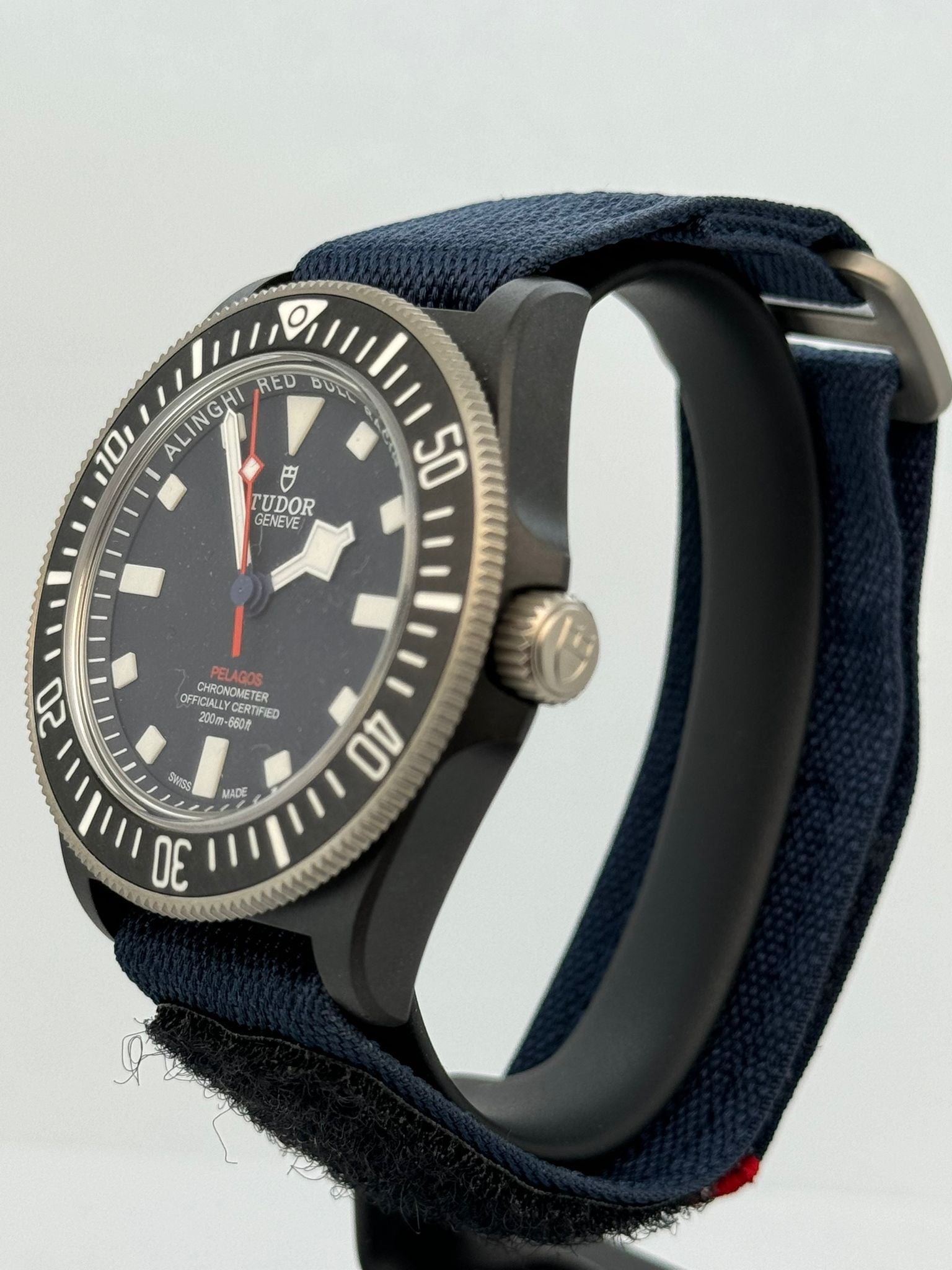 PELAGOS FXD BLACK CARBON 'ALINGHI RED BULL' BLUE DIAL (2025)